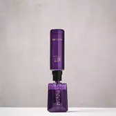Purple Mugler Alien refill bottle connected upside down to matching perfume bottle