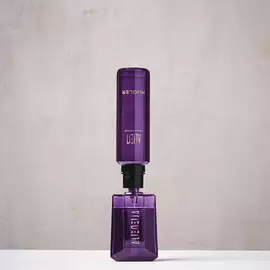 Purple Mugler Alien refill bottle connected upside down to matching perfume bottle
