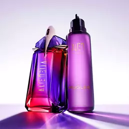 Alien Hypersense fragrance bottle in purple and pink glass beside a matching purple refill bottle, illuminated against a soft lavender background with reflective light effects.