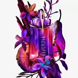 Alien Hypersense bottle surrounded by purple flowers, fruit, and dark wood