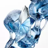 Blue Angel Mugler star perfume bottle with icy, fluid blue abstract backdrop