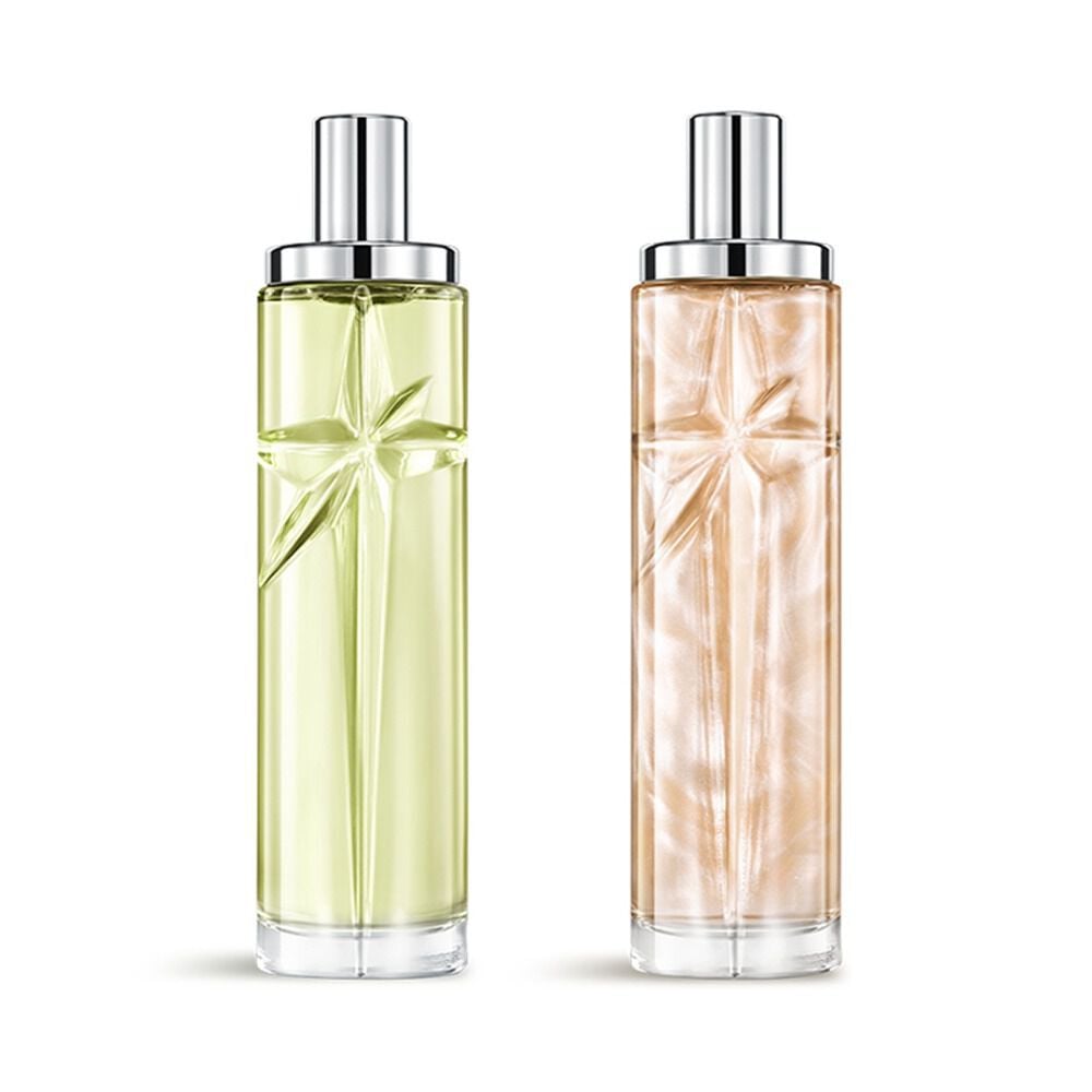 Starlicious the creamy delight layering bundle packshot with Pineapple Musk and Pistachio Praline, glass bottles with a carved shooting star, its facets shining bright beneath a sleek silver cap.