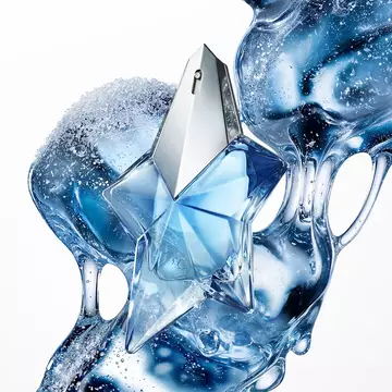 Blue Angel Mugler star perfume bottle with icy, fluid blue abstract backdrop