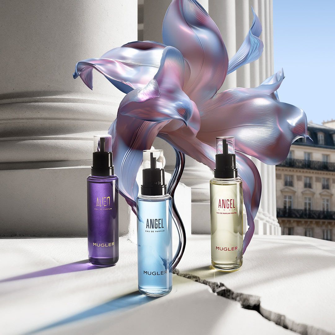 Mugler Mother's Day 2026 campaign banner featuring the iconic Angel and Alien refills in a celestial floral and Parisian landscape, celebrating extraordinary mothers.
